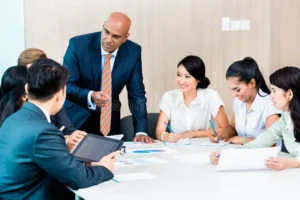diversity-team-business-development-meeting-charts-indian-ceo-caucasian-executive-crunching-numbers-figures-66631875
